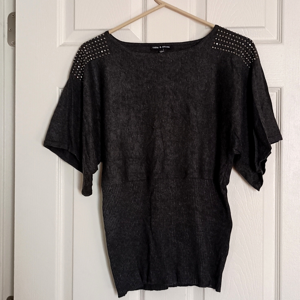 Grey sequined top with fitted waist and wide sleeves